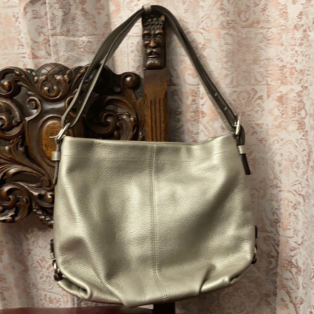Women’s Leather Coach purse very gently used. Clean lilac lining. Nice neutral